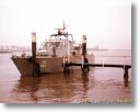 Boot 151 an einem Anleger bei Brake